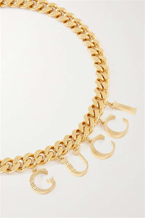 gucci gold silppers|Gucci gold necklace.